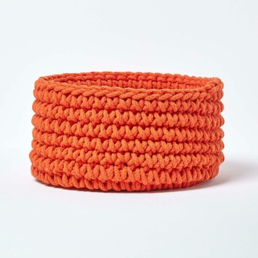 HOMESCAPES Burnt Orange Cotton Knitted Round Storage Basket, 37 x 21 cm