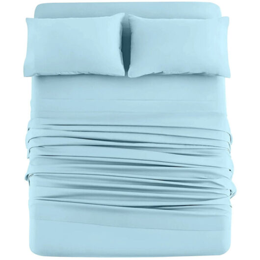 Four-piece bed linen set in pure knitted cotton, soft and breathable, with deep pockets, weight 145 grams, aqua blue